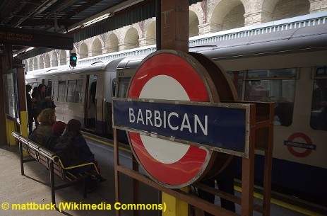 A westbound London Underground train calls at Barbican